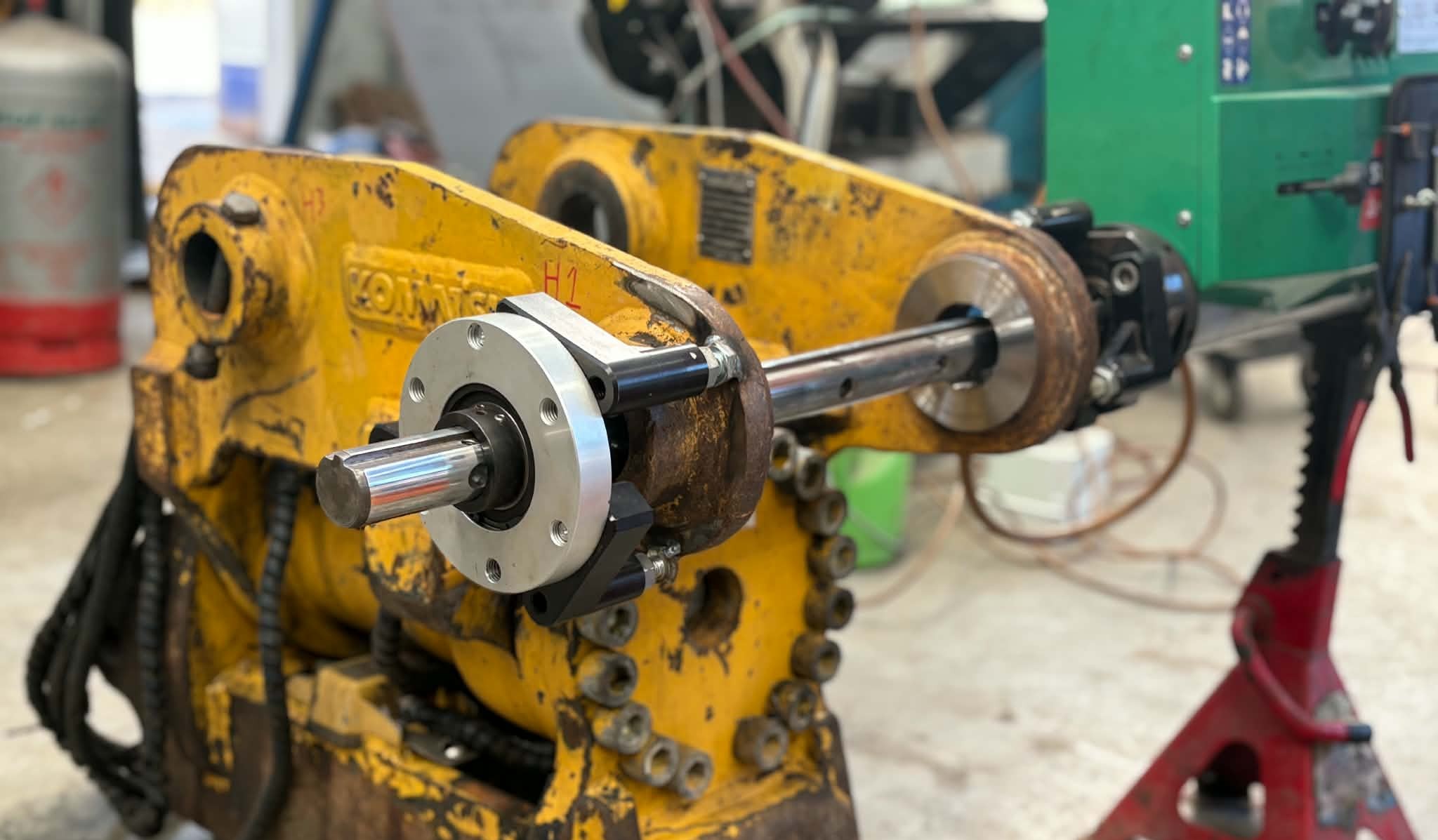 Line boring setup for heavy equipment repair